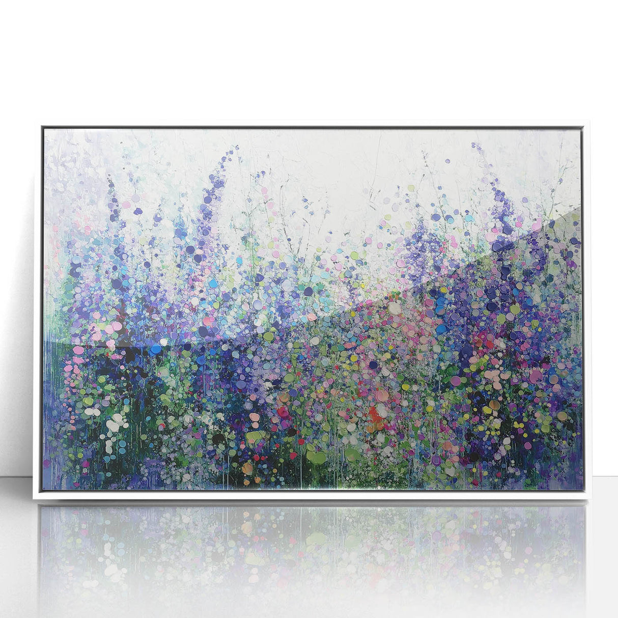 Framed acrylic artwork showcasing vibrant abstract florals in shades of pink, blue, and green, designed to enhance modern home decor with a fresh, artistic touch.