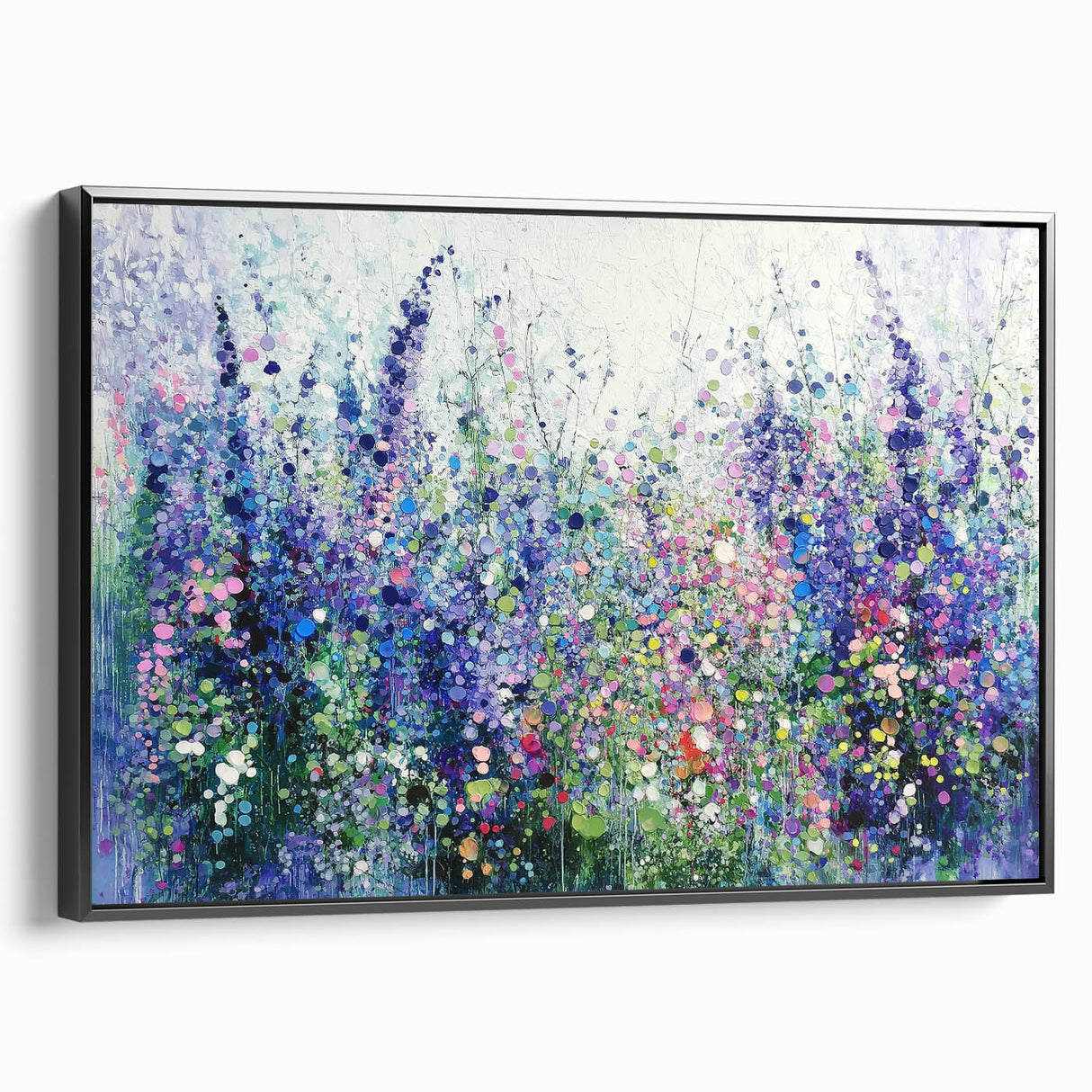 Framed canvas artwork showcasing an abstract floral design in vibrant colors, set against a sleek black frame. Perfect for modern home decor or art enthusiasts.