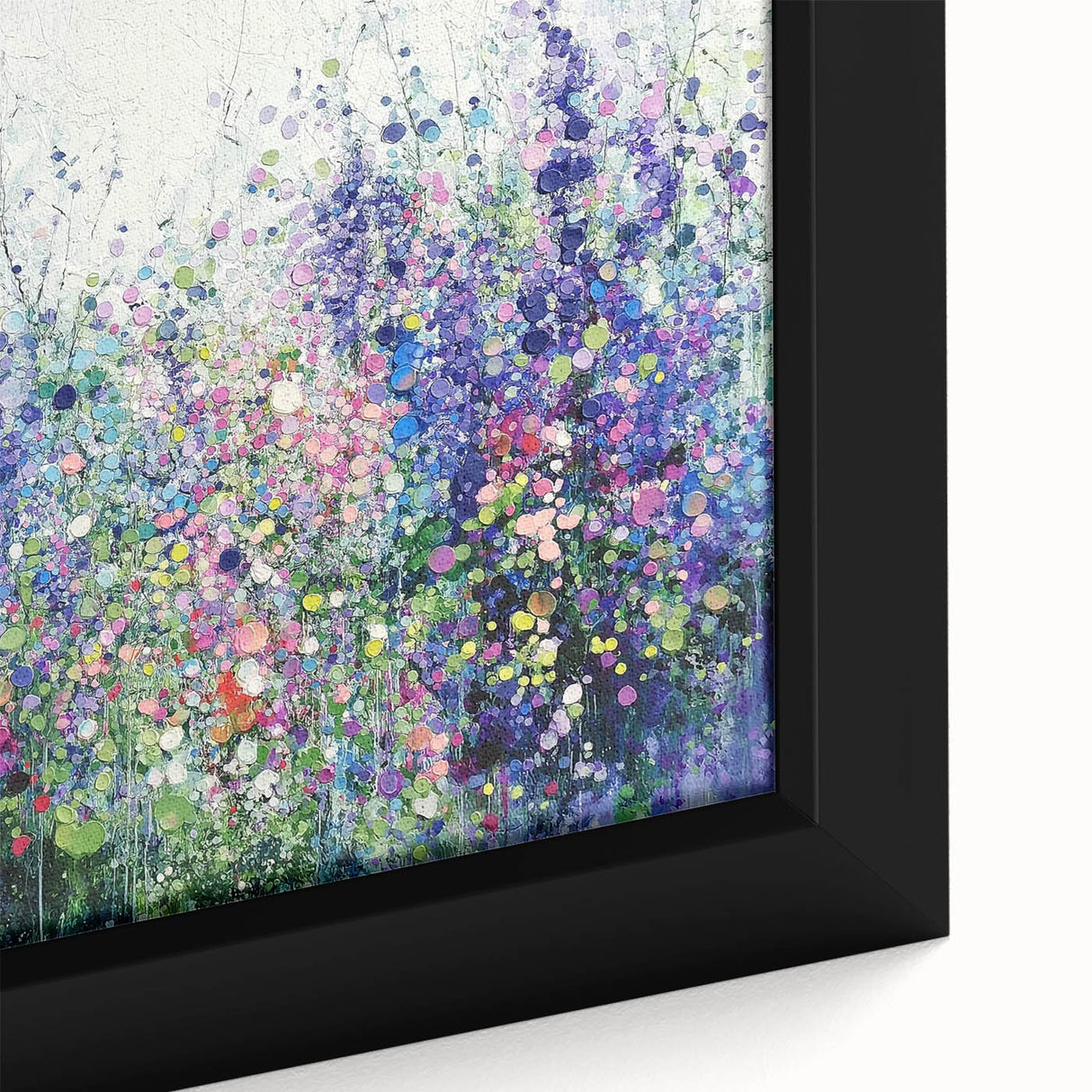 Close-up of a framed abstract floral canvas artwork showcasing vibrant colors and intricate details, perfect for modern home decor and enhancing indoor aesthetics.