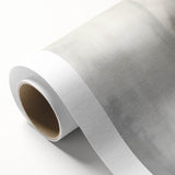 Abstract minimalist wall art on rolled canvas showcasing soft pastel colors and geometric shapes, elegantly packaged in a protective cardboard tube for easy display.