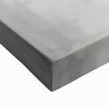 Close-up of an abstract minimalist stretched canvas featuring soft pastel colors and geometric shapes, perfect for modern home decor.