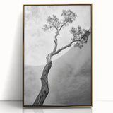 Framed acrylic artwork featuring an abstract floral design in vibrant colors, set in a gold frame, perfect for modern home decor. Ideal for enhancing interior aesthetics.