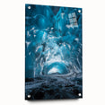 Acrylic glass art piece showcasing a vibrant landscape scene of caves, featuring intricate details and color variations, displayed in a side view with decorative pins.