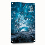 Acrylic glass art piece showcasing a vibrant landscape scene of caves, featuring intricate details and color variations, displayed in a side view with decorative pins.