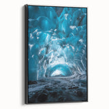 Framed canvas artwork depicting a stunning landscape with caves, featuring rich earth tones and intricate details, displayed in a black frame for a modern aesthetic.