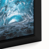 Close-up of a beautifully framed canvas showcasing a vibrant landscape with intricate cave details, ideal for home decor and art enthusiasts.