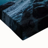 Close-up of a stretched canvas artwork depicting colorful, textured landscapes and caves, showcasing intricate details and natural elements for vibrant home decor.