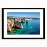 Framed landscape artwork depicting majestic cliffs with a black mat, showcasing natural beauty in a polished front view, perfect for home decor enhancement.
