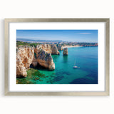 Framed landscape artwork showcasing dramatic cliffs with a silver mat border, ideal for enhancing home decor or office spaces, adding a touch of elegance.