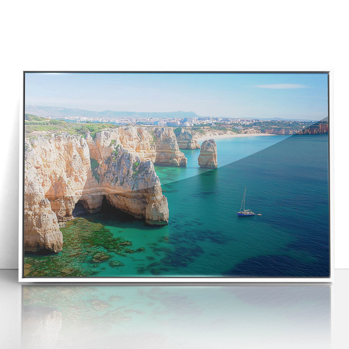 Framed acrylic landscape artwork depicting dramatic cliffs with a vibrant sunset, set in a sleek white frame, perfect for enhancing modern home decor.