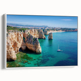 Framed canvas artwork showcasing a stunning landscape of rugged cliffs against a serene sky, featuring a sleek white frame that enhances its modern aesthetic. Ideal for home decor or office spaces, this piece adds a touch of nature-inspired elegance to any interior.