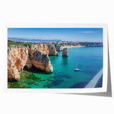 Vibrant rolled canvas print showcasing a stunning landscape of majestic cliffs under a bright blue sky, ideal for home decor enthusiasts seeking nature-inspired art.