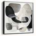 Framed canvas artwork showcasing an abstract geometric design in black, highlighting sharp angles and modern aesthetics. Ideal for contemporary home decor.