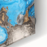 Close-up view of vibrant abstract acrylic splatters on glass, showcasing a colorful blend of blues, yellows, and reds, ideal for modern decor and art enthusiasts.