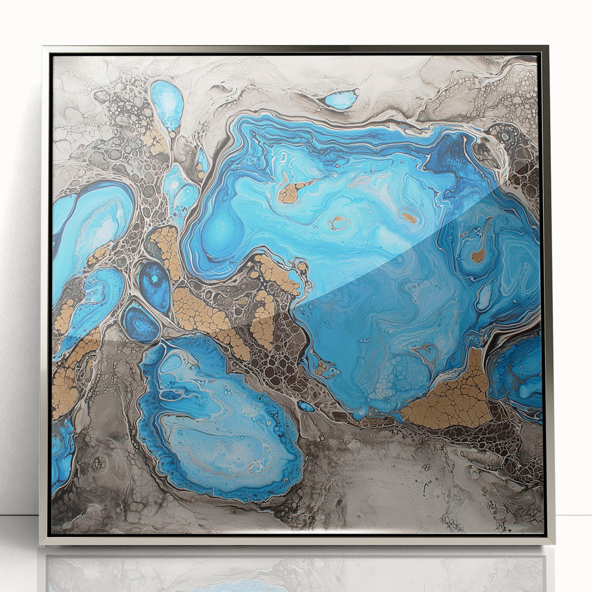 Framed abstract artwork featuring colorful splatters on a sleek silver background, perfect for modern home decor, adding vibrancy and artistic flair to any space.