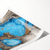 Abstract splatter art print showcasing vibrant colors and dynamic patterns, rolled and secured in a protective tube, perfect for modern home decor.