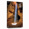 Acrylic wall art depicting a vibrant landscape of canyons, showcasing rich colors and intricate details, displayed from a side view with decorative pins.