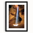 Black-framed landscape art print depicting stunning canyons, featuring a sleek design with a white mat, perfect for home decor and accentuating modern interiors.