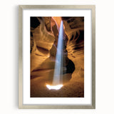 Framed landscape artwork showcasing canyons in vibrant hues, surrounded by a sleek silver mat, ideal for enhancing home decor with natural beauty and style.