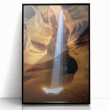 Framed acrylic art piece showcasing a stunning landscape of canyons with rich earth tones, featuring a sleek black frame, perfect for modern home decor.