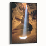 Framed canvas artwork depicting a stunning landscape of canyons, featuring rich earth tones and intricate details, presented in a sleek black frame for modern decor.