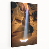 Stretched canvas artwork depicting a vibrant landscape of canyons under a bright blue sky, showcasing rich earthy tones and intricate details for home decor enhancement.