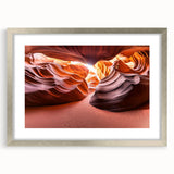 Silver-framed desert landscape artwork with a white mat, showcasing vibrant colors and intricate details, perfect for enhancing home decor.