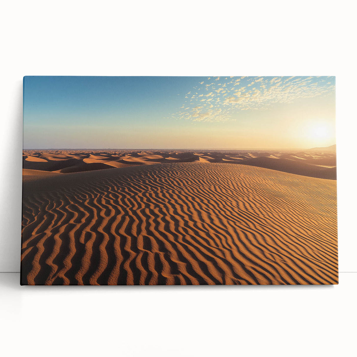 Stretched canvas artwork depicting serene sand dunes at sunset, showcasing warm tones of orange and gold, perfect for modern home decor or office spaces.