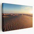 Stretched canvas artwork showcasing a serene desert landscape with golden sand dunes under a blue sky, perfect for modern home decor.