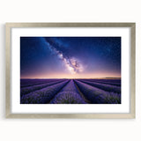 Framed landscape art print showcasing vibrant green fields and a serene blue sky, set in a sleek silver frame with a white mat, ideal for home decor.