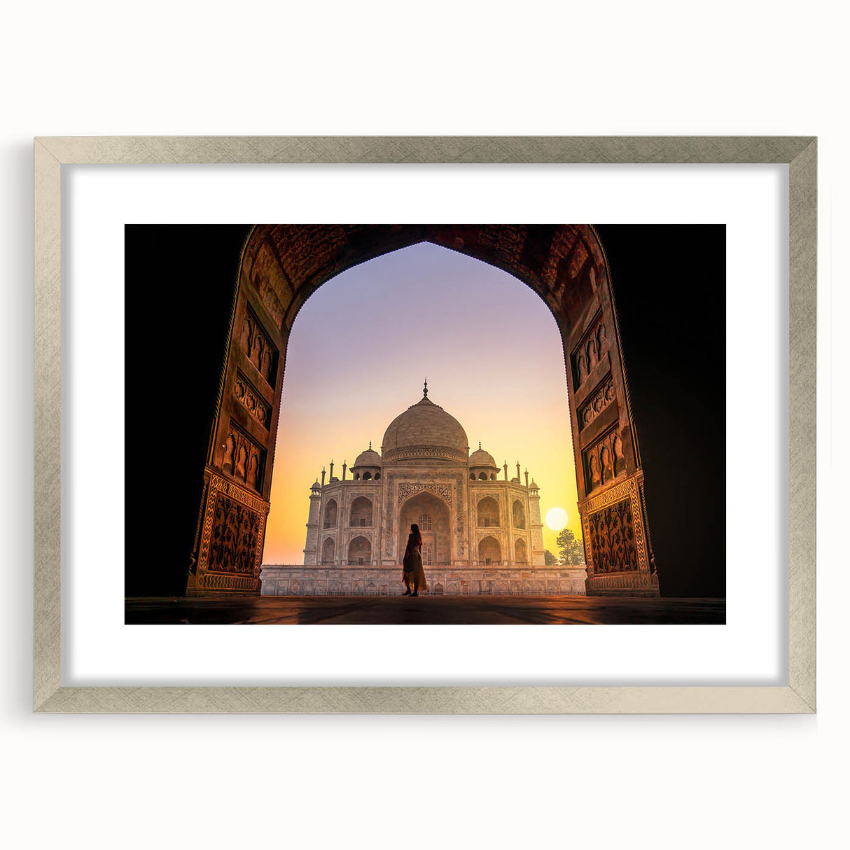 Textured art print depicting an abstract scenery with earthy tones on a framed silver mat, ideal for bedroom art.