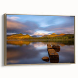 Framed canvas featuring a vintage-style landscape painting of Cumbria, England, in muted earth tones.