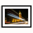 Abstract art print of London scenery in vibrant colors on textured canvas, framed in black, ideal for living room decor.