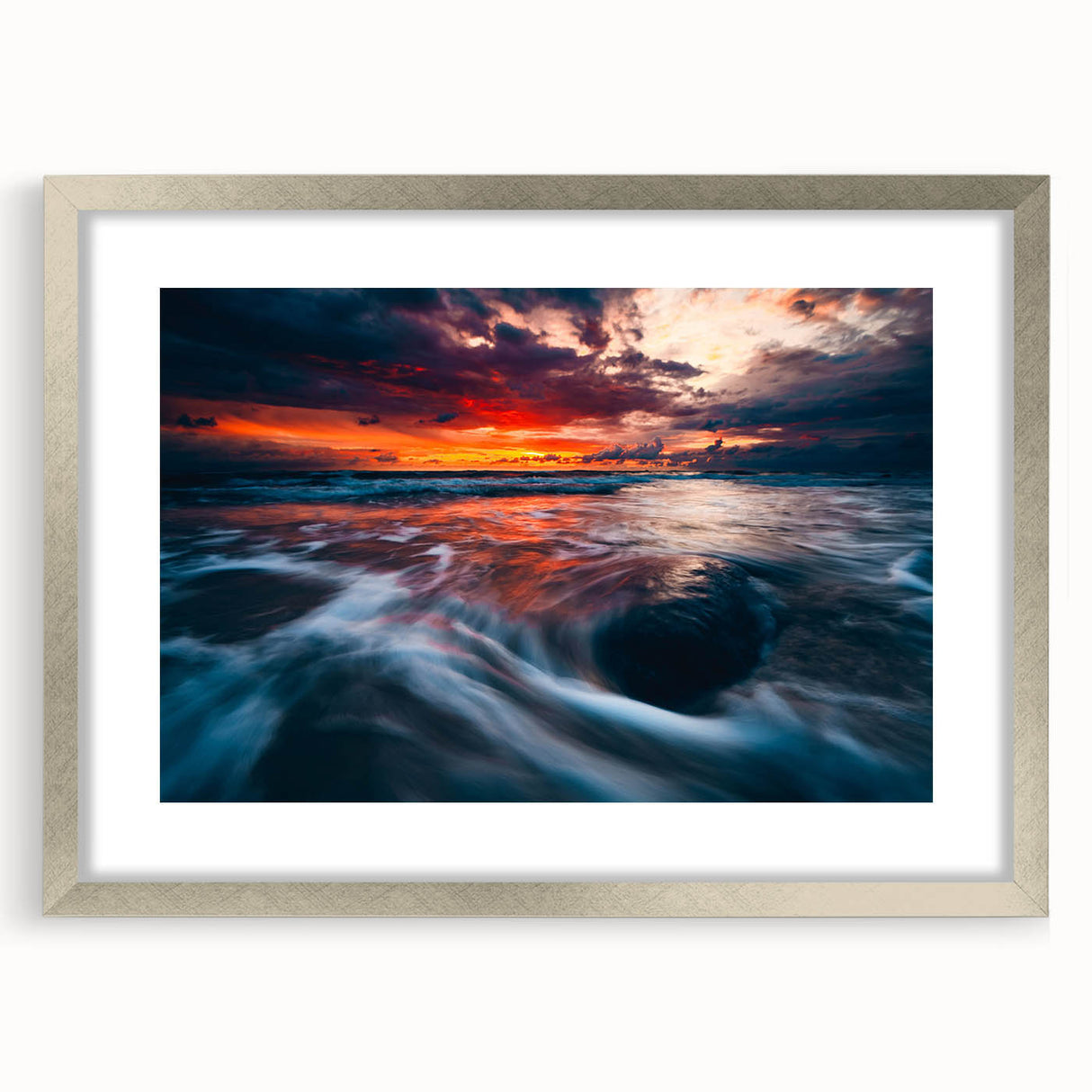 Extra large abstract art print of a European scenery in muted blue and green tones, framed in silver.