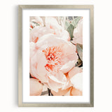 Textured art print featuring abstract green and yellow patterns on a silver-framed canvas, ideal for bedroom decor.