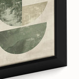 Close-up of a framed minimalist abstract wall art piece showcasing geometric shapes in muted tones of blue, gray, and white, perfect for modern home decor.