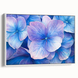 Framed canvas artwork showcasing an abstract floral design in vibrant colors, elegantly presented with a white frame, ideal for modern home decor.