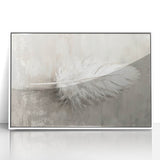 Framed acrylic wall art featuring an abstract minimalist design in white tones, perfect for modern home decor, showcasing clean lines and gentle shapes.