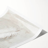 Abstract minimalist wall art print featuring soft pastel colors and geometric shapes, rolled and packaged in a protective cardboard tube for easy transport.