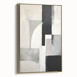 Framed minimalist wall art canvas displaying an abstract design in gold tones, positioned at a side angle to highlight its sleek profile and modern aesthetic.