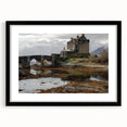 Elegant landscape artwork featuring a castle framed in black with a mat, showcasing intricate details and rich colors, perfect for home decor enhancement.