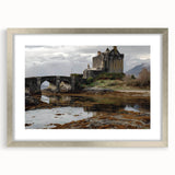 Framed landscape artwork depicting a beautiful castle scene, elegantly presented in a silver frame with a mat, perfect for home decor.
