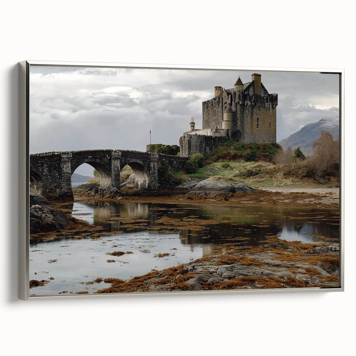 Framed canvas artwork showcasing a majestic landscape castle scene, highlighted with silver framing. The piece adds elegance to home decor, ideal for art enthusiasts.