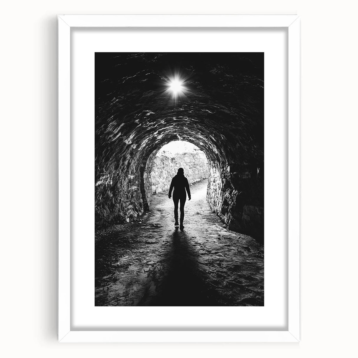 Framed landscape artwork depicting a serene cave scene, showcasing earthy tones and intricate details, perfect for enhancing home decor with a natural touch.