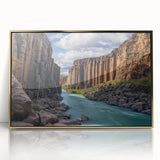 Framed acrylic artwork showcasing a breathtaking landscape of dramatic cliffs under a vibrant sky, embellished with gold accents for an elegant touch.