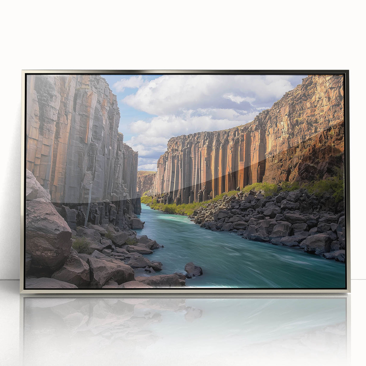Framed acrylic artwork of dramatic cliffs above a serene landscape, showcasing rich colors and detailed textures, perfect for modern home decor.