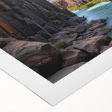 Stunning rolled canvas artwork depicting vibrant cliffs and landscapes, showcasing rich colors and intricate details, perfect for home decor.