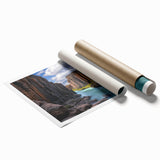 Vibrant landscape cliff print on rolled canvas showcasing stunning hues of blue and green, elegantly displayed in a protective cardboard tube for shipping.