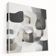 Abstract geometric stretched canvas artwork showcasing vibrant colors and intricate shapes, ideal for modern home decor. The side view highlights its depth and texture, making it a striking addition to any interior space.