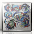 Framed abstract wall art featuring colorful splatter designs on a sleek black background, perfect for modern home decor. Ideal for adding a vibrant touch to any room.